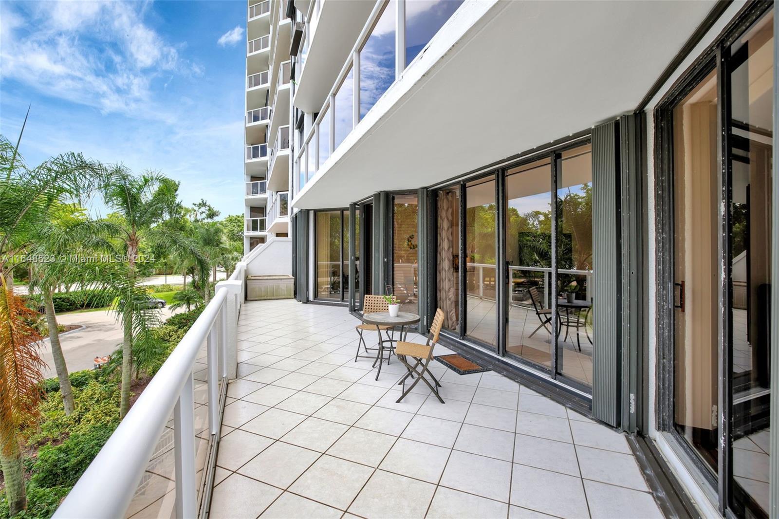 a view of balcony with furniture