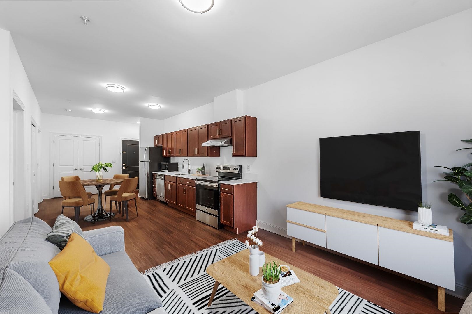 a living room with furniture and a flat screen tv