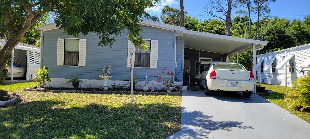 a car parked in front of a house