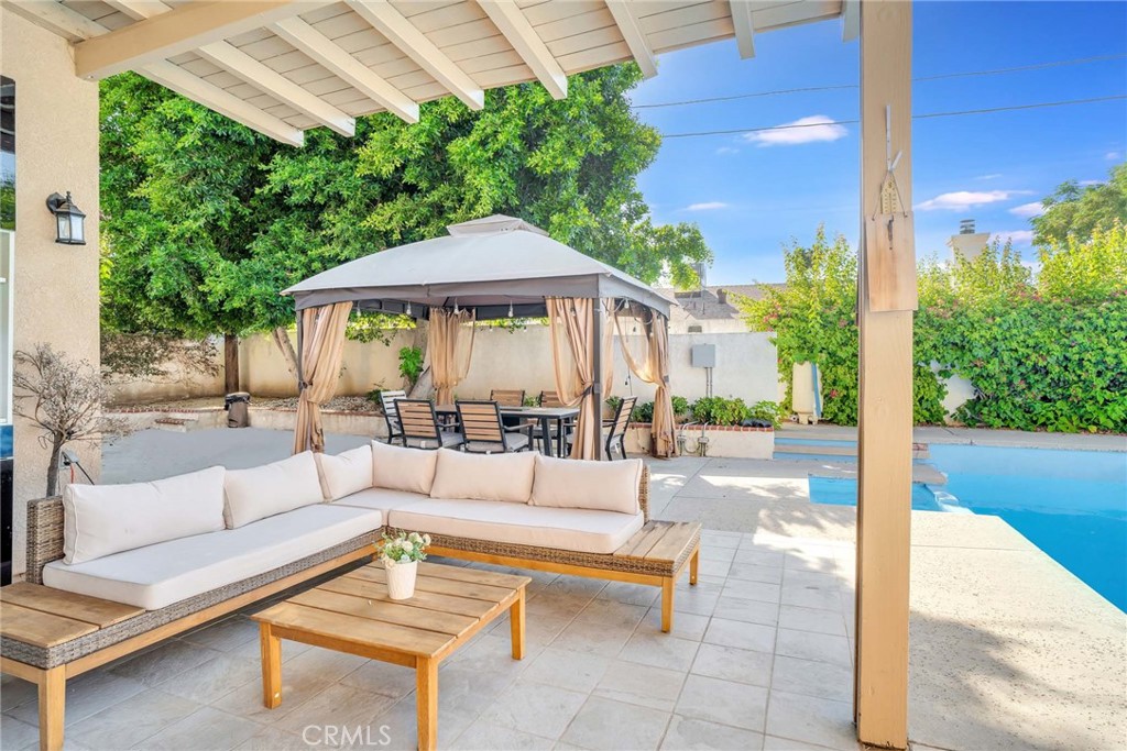 a outdoor space with patio lots of green space