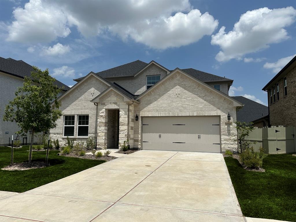 a front view of house with yard