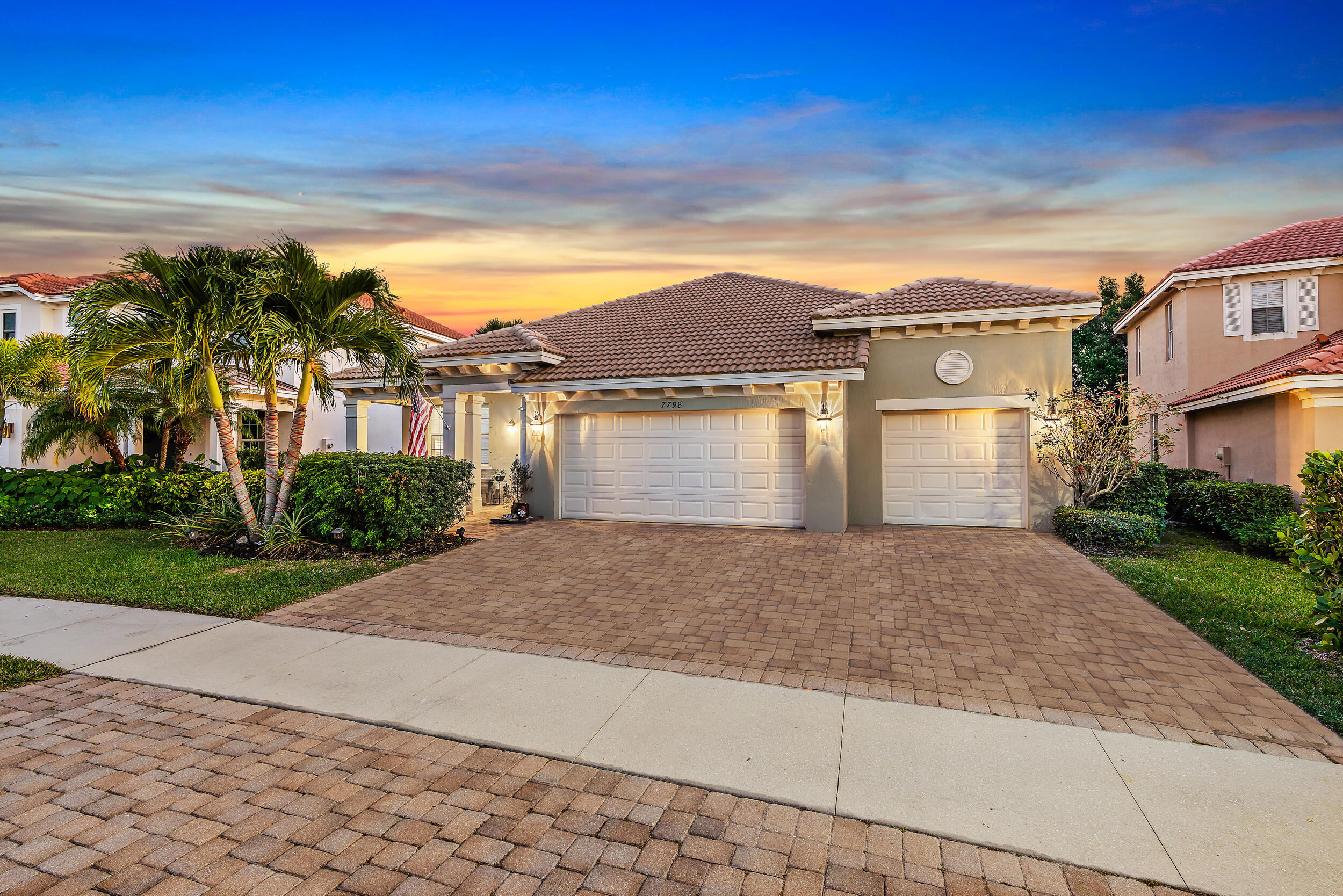 front view of a house with a yard