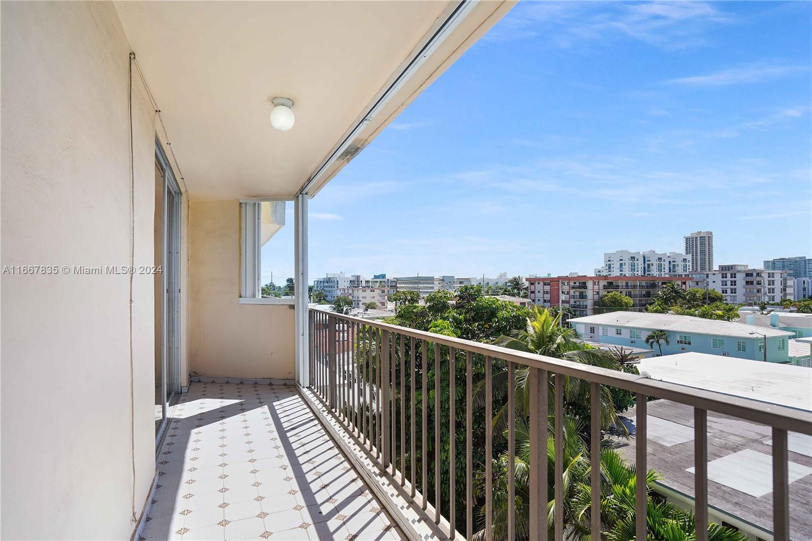 a view of a balcony with city view