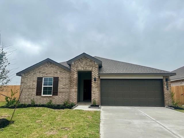 a front view of a house with garage