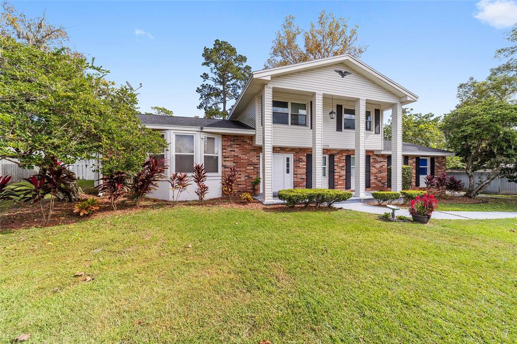 front view of a house with a patio