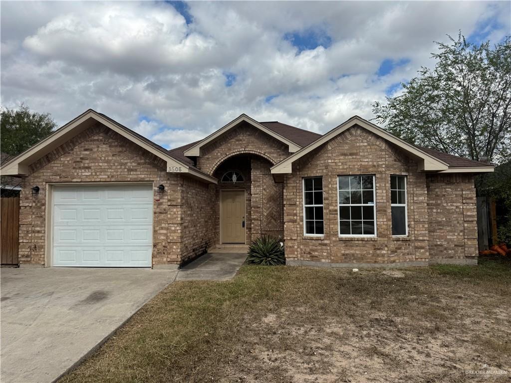 View of front of home featuring a garage