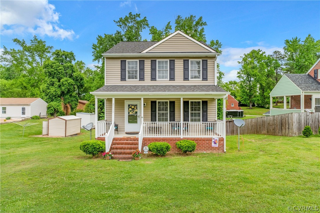 front view of a house with a yard