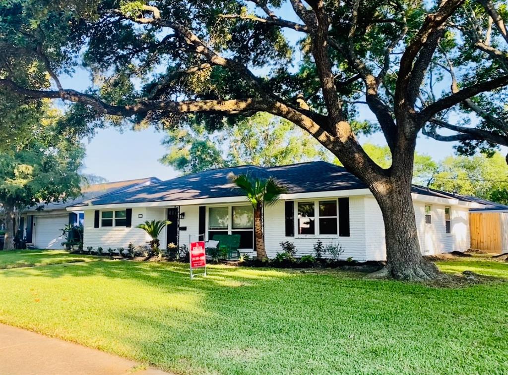 Home sits on a corner lot (8,400 square feet) shaded by large oak trees. Home has NEVER FLOODED.