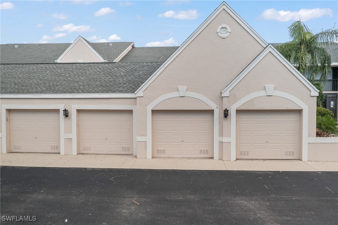 an arial view of house along with street