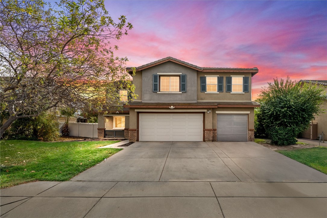 a house with yard in front of it