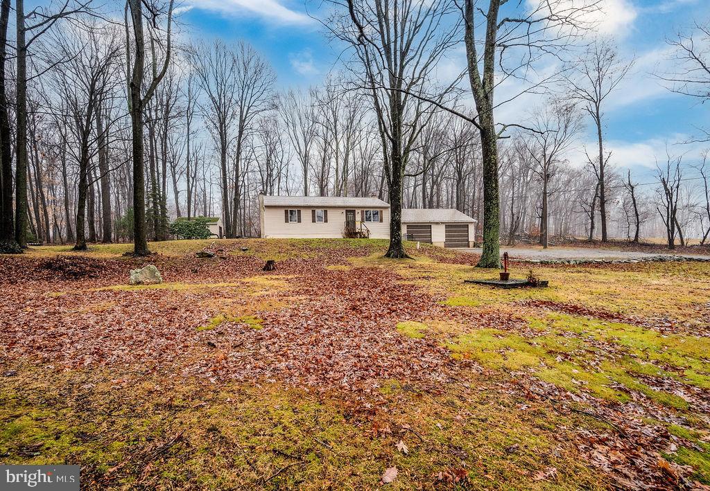 a house with trees in front of it