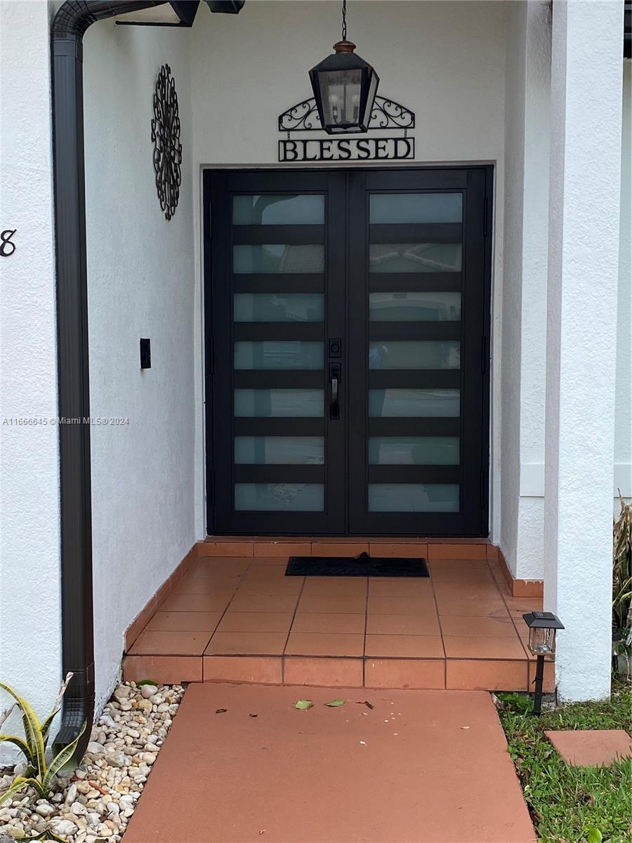 a view of entryway with a front door