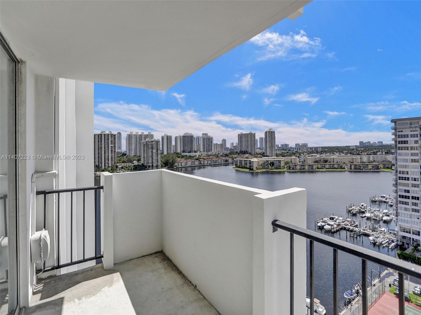 a view of a balcony with city view