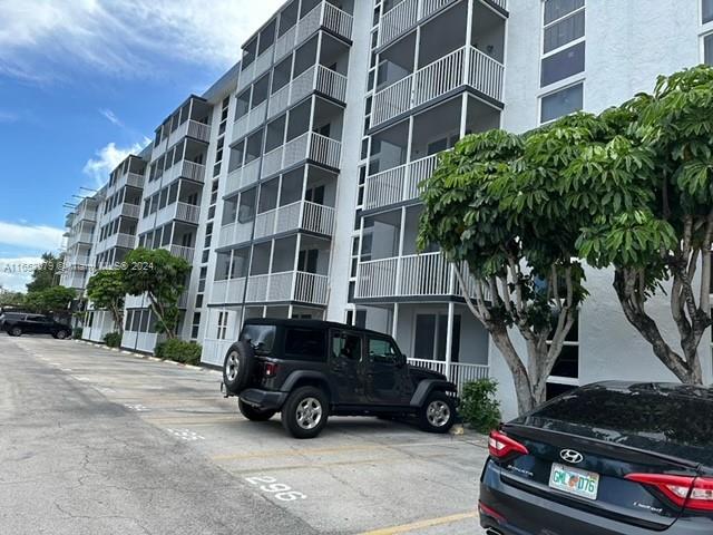 a car parked in front of a building