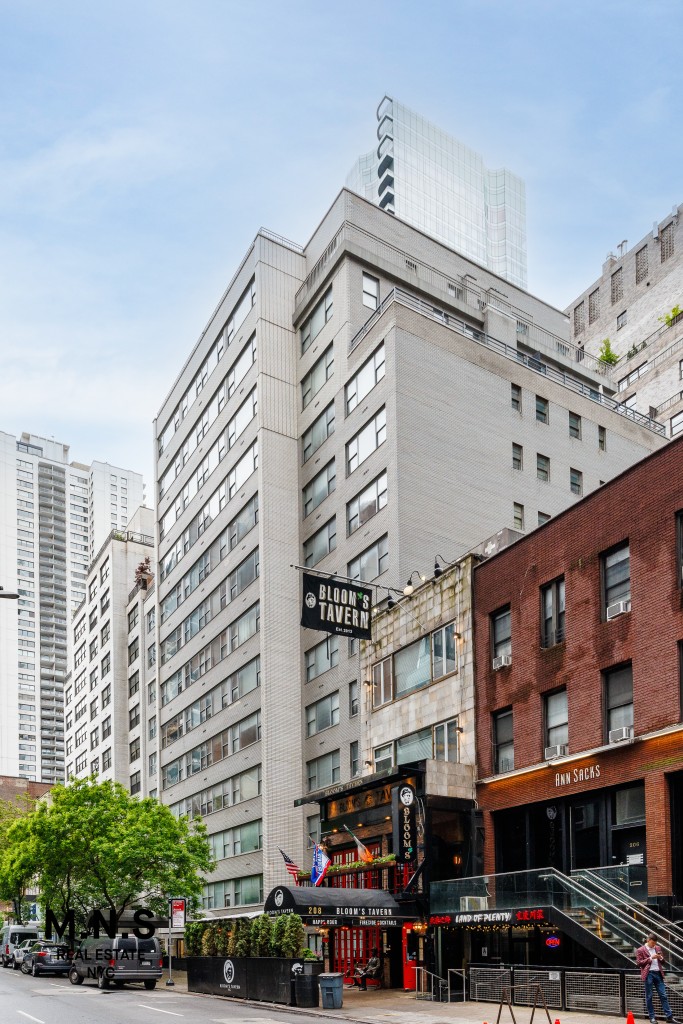 a view of a building with a street