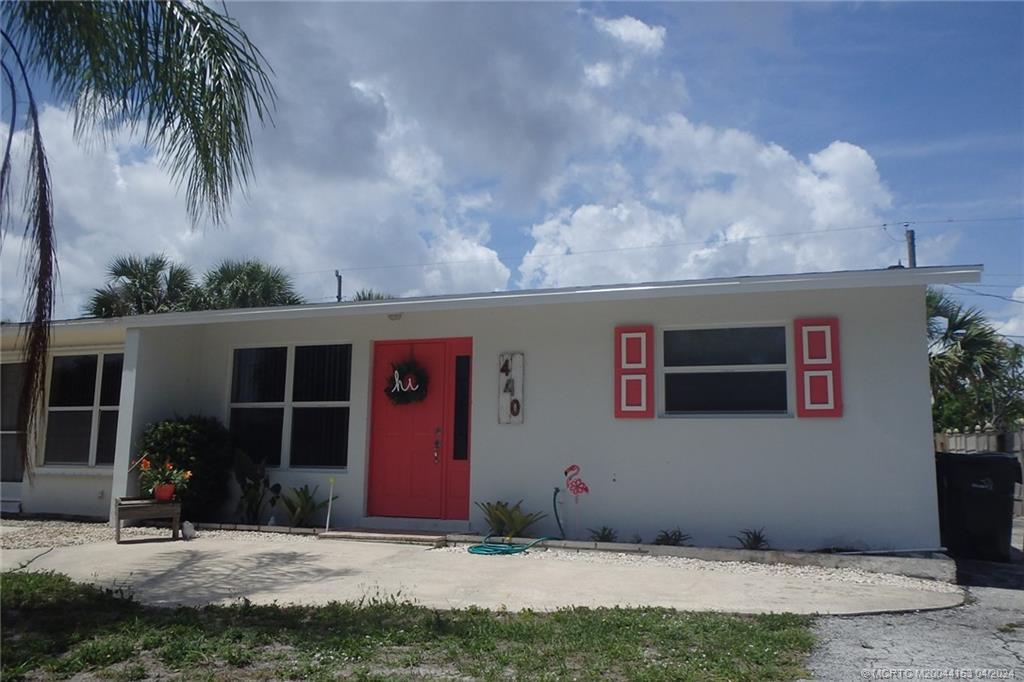 a front view of a house with yard