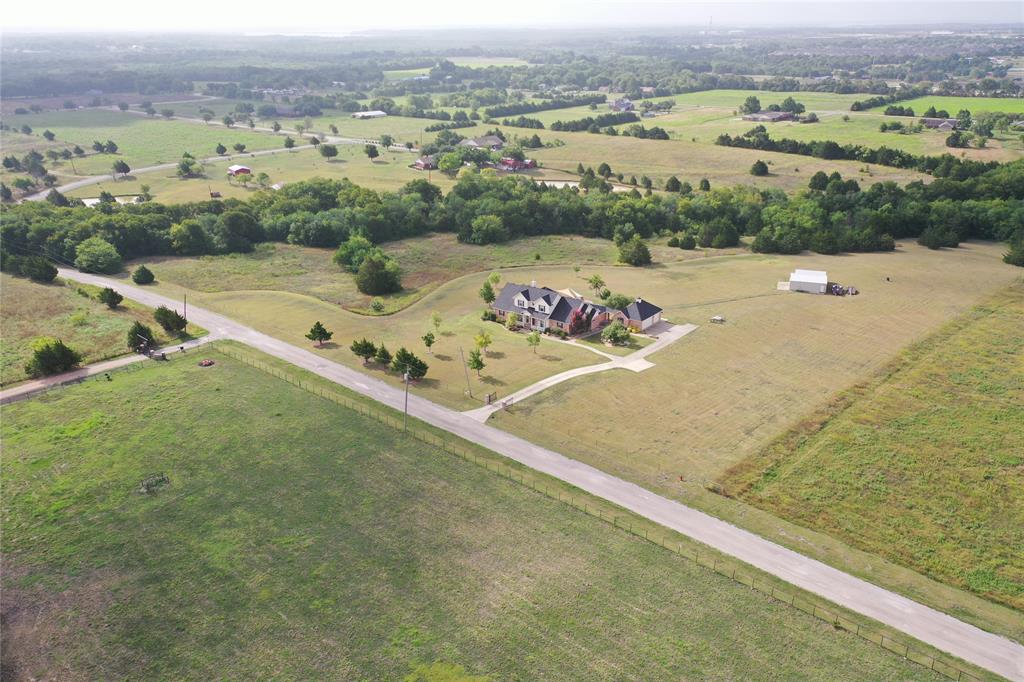 an aerial view of a house with a outdoor space