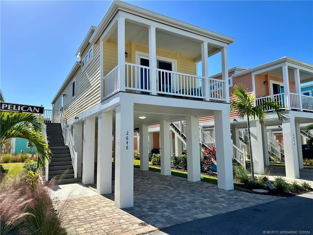 a view of a house with a porch