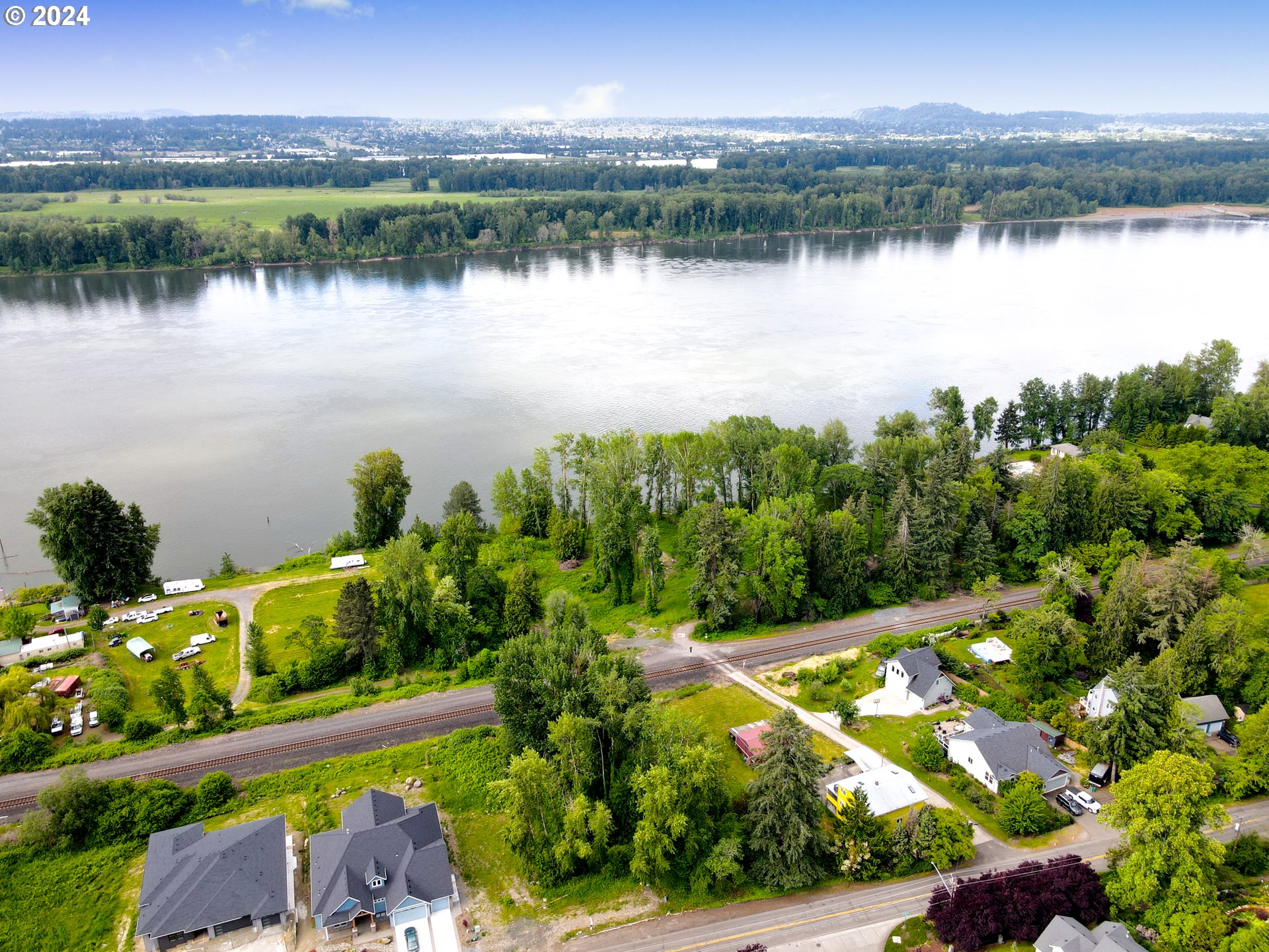 a view of a lake with a city view