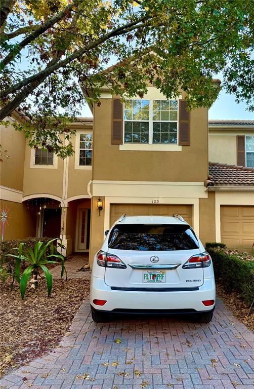 a car parked in front of a house