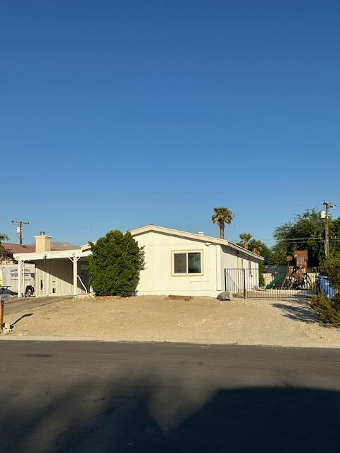 a view of a street with houses