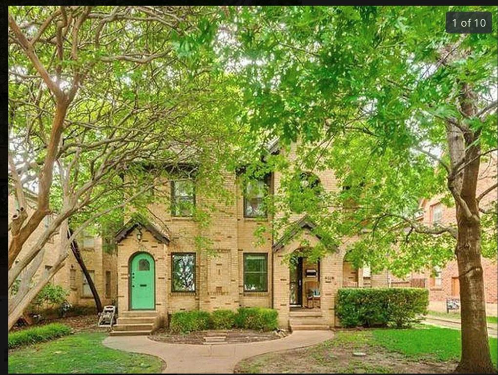 front view of a house with a garden