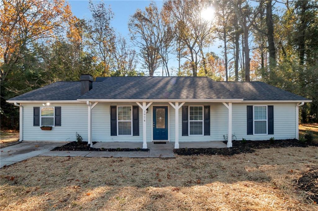 front view of a house with a yard