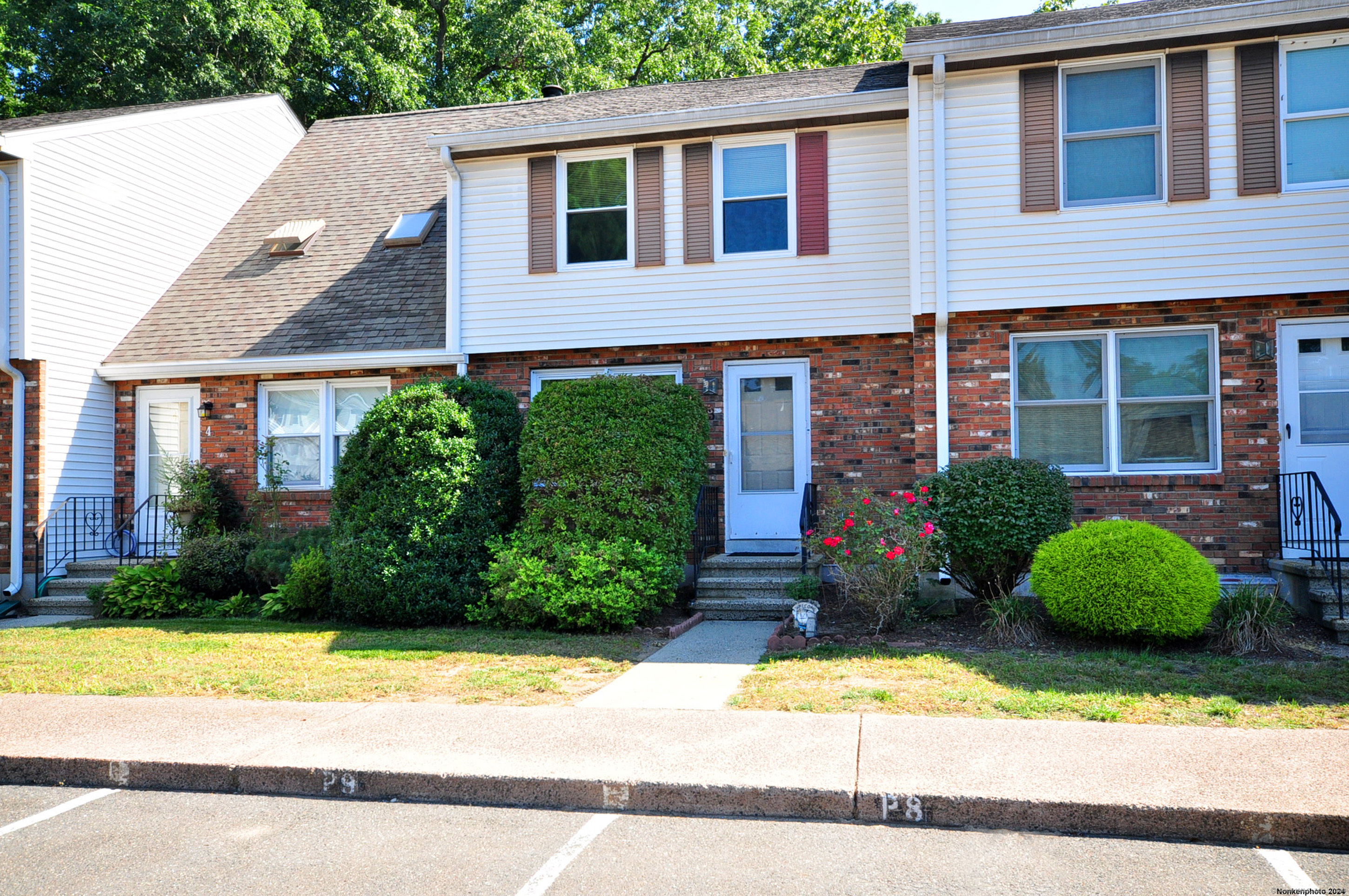 a view of a house with a garden