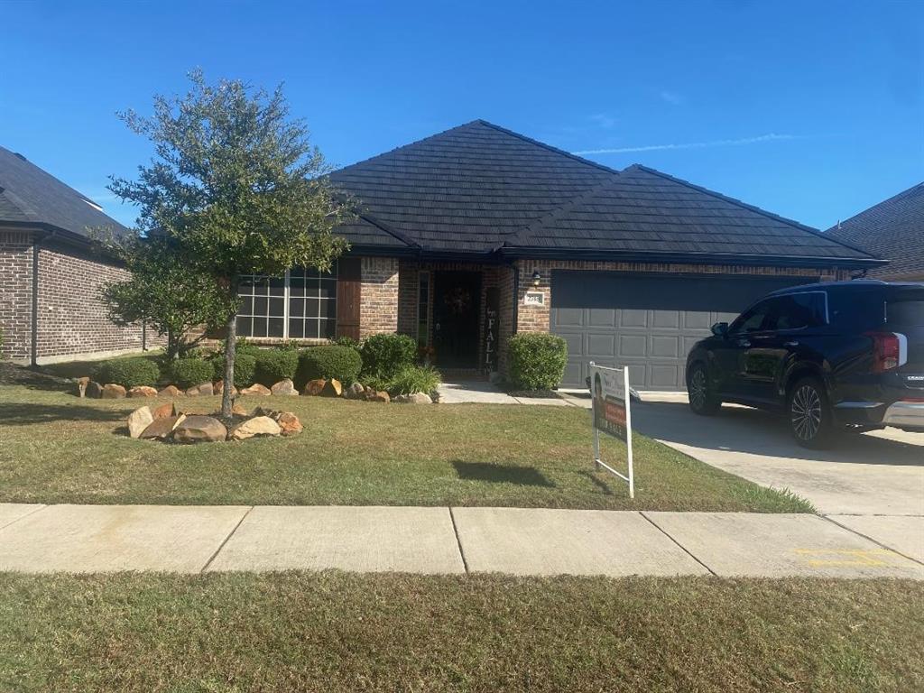 a front view of house with garage