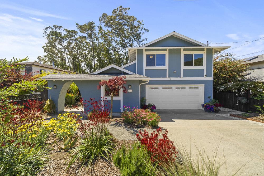 front view of a house with a yard