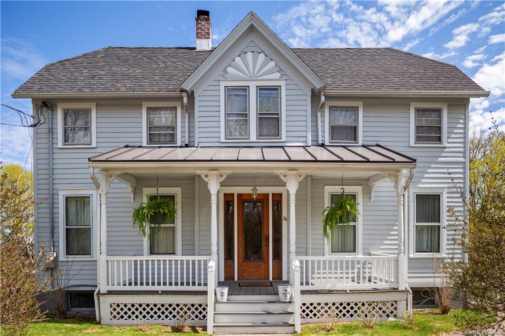 View of front of home with covered porch