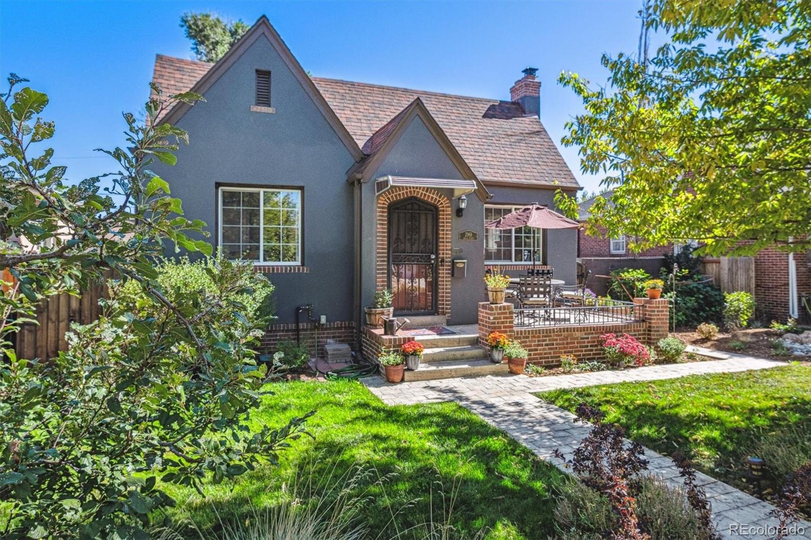 front view of a house with a yard