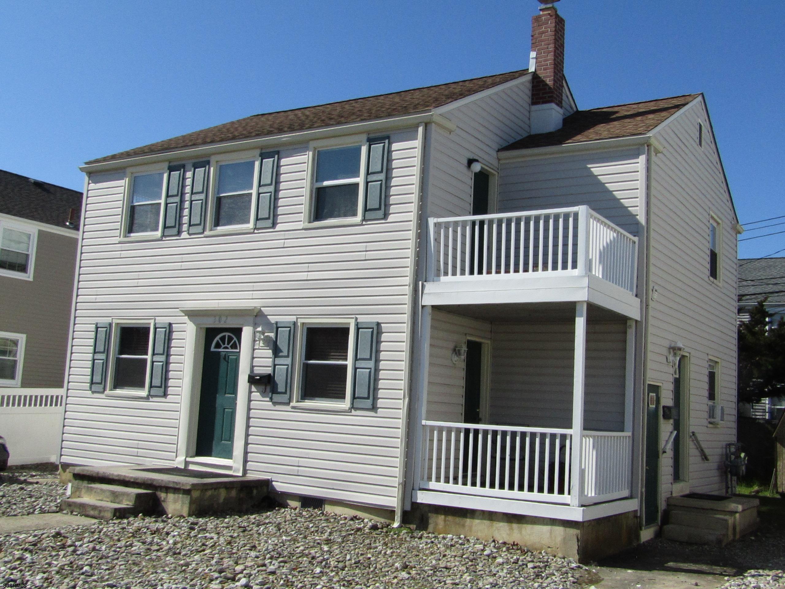 a view of a house with a porch