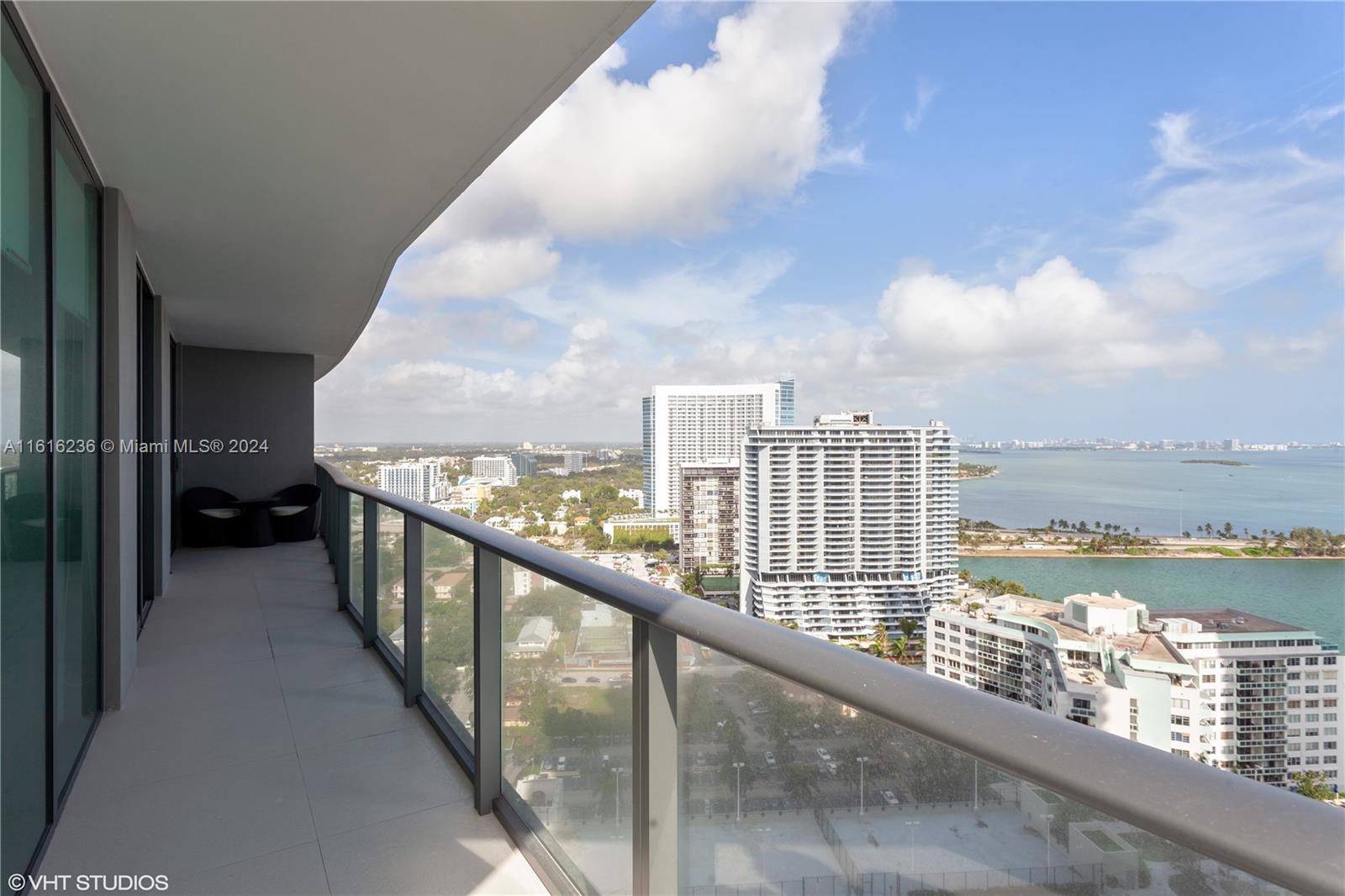 a view of a balcony with city view