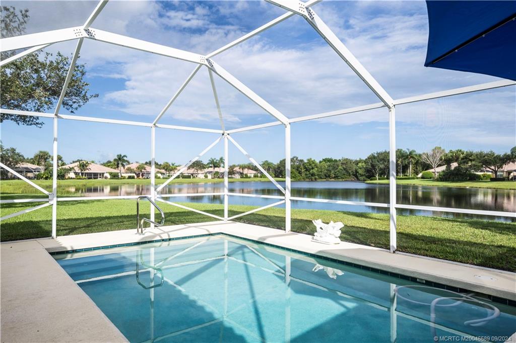 a view of outdoor space with swimming pool