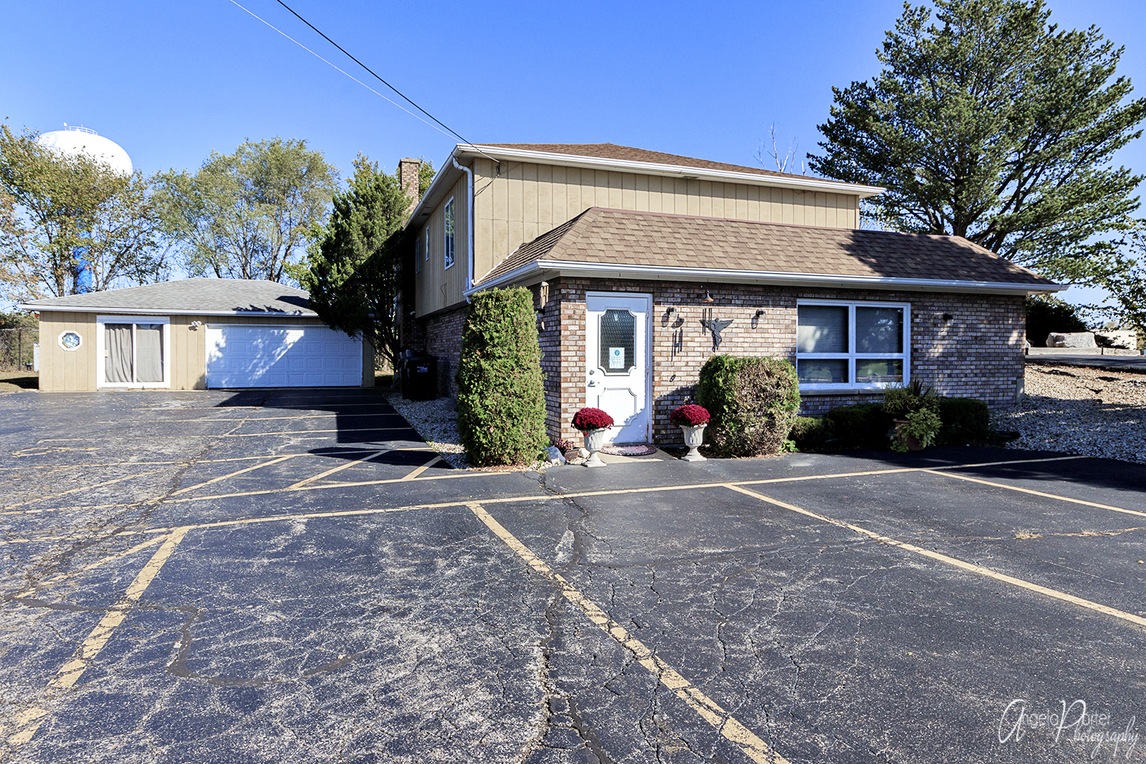 a view of a house with a yard