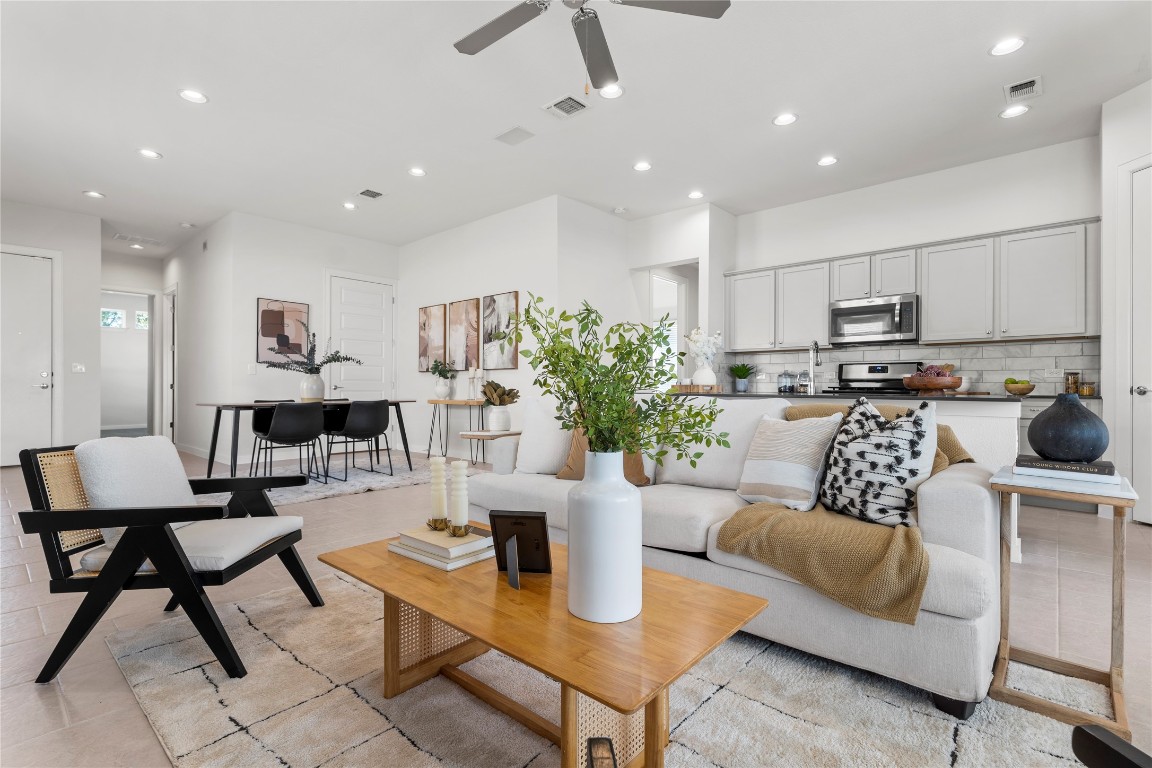 a living room with furniture and a couch