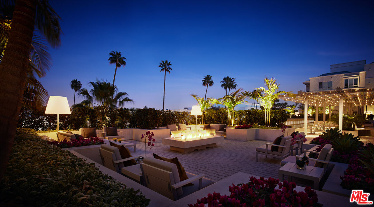 a view of a chairs and tables in patio