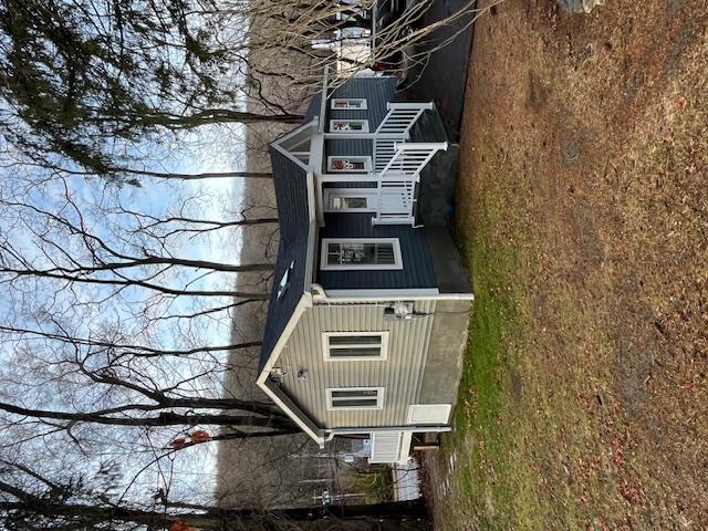 View of front facade with a front lawn