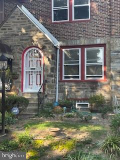 a view of house with front door