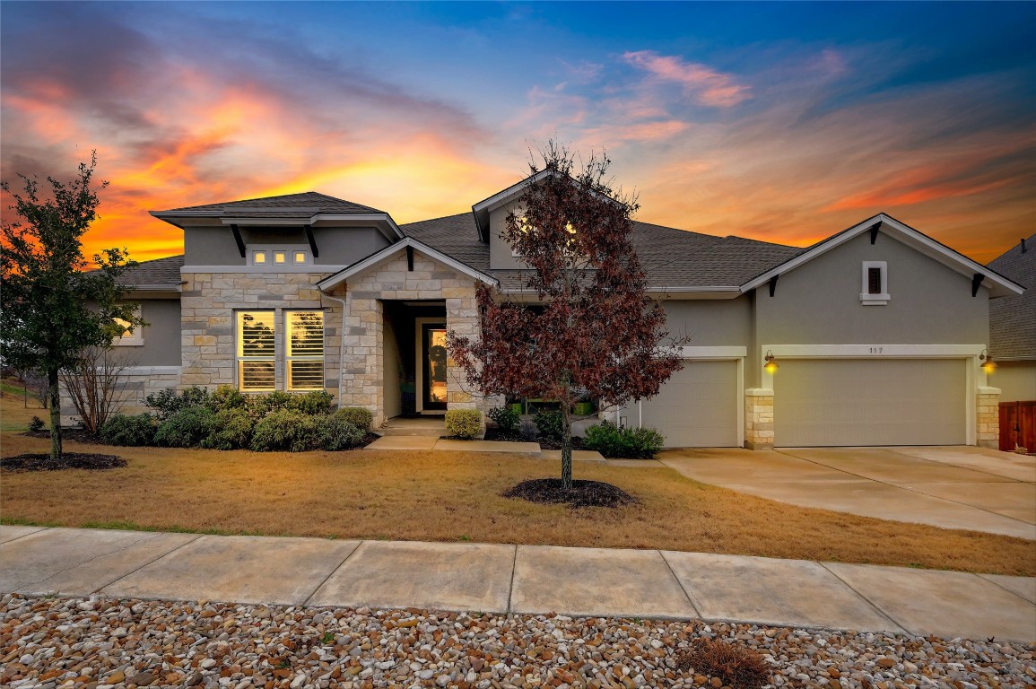 front view of a house with a yard