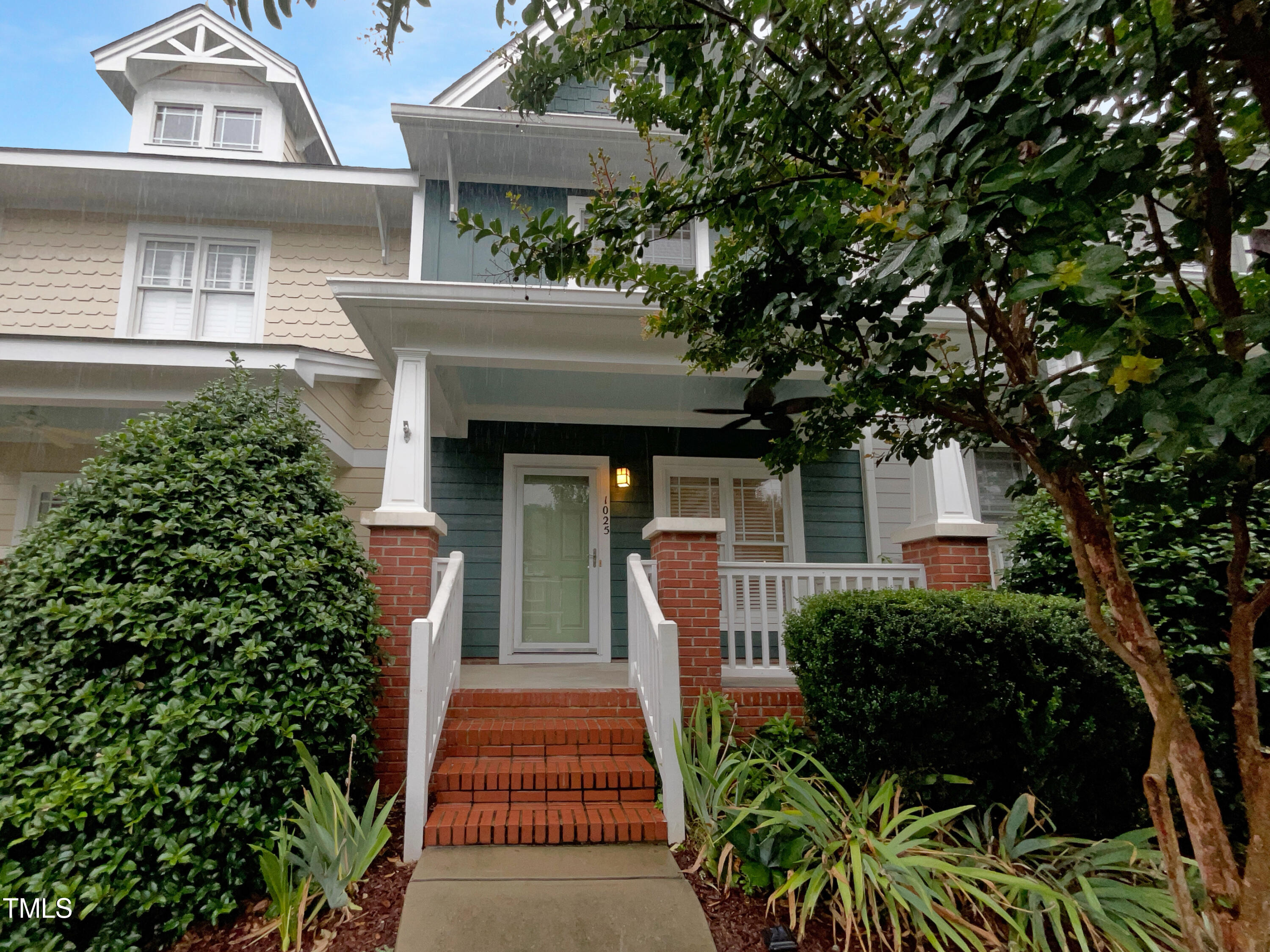 a front view of a house with a porch