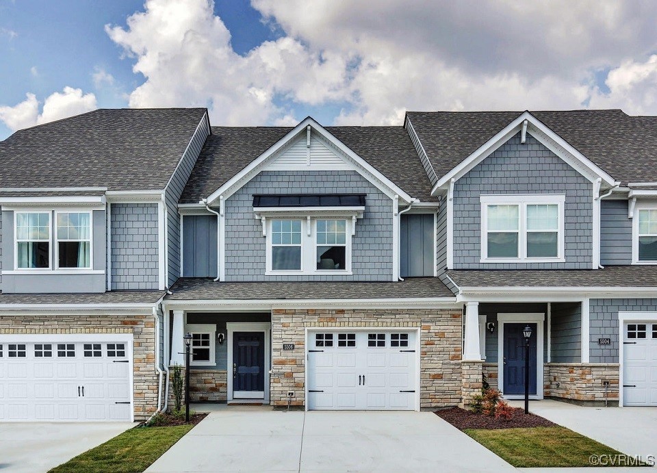 a front view of a house with yard