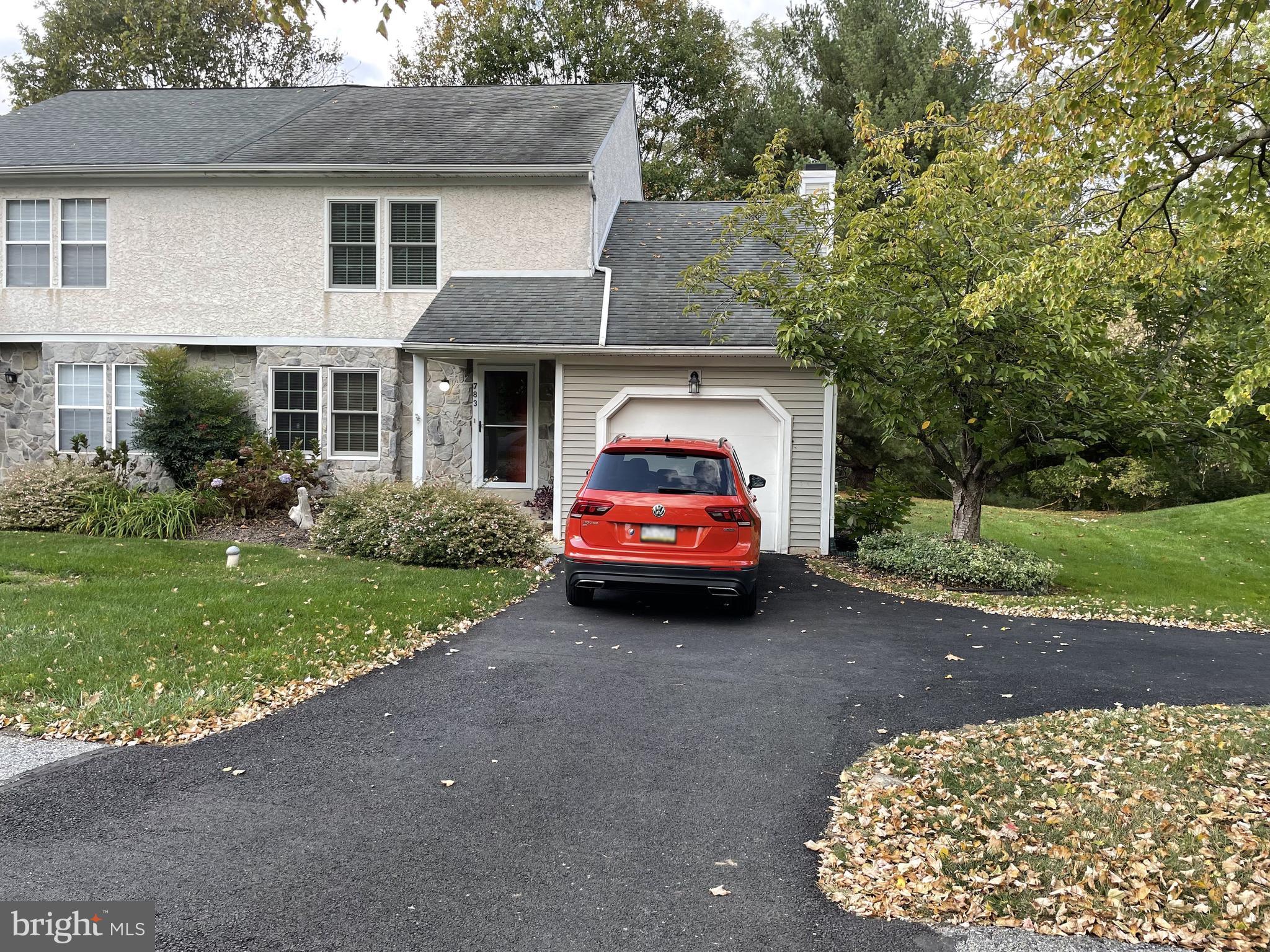 a house view with a garden space