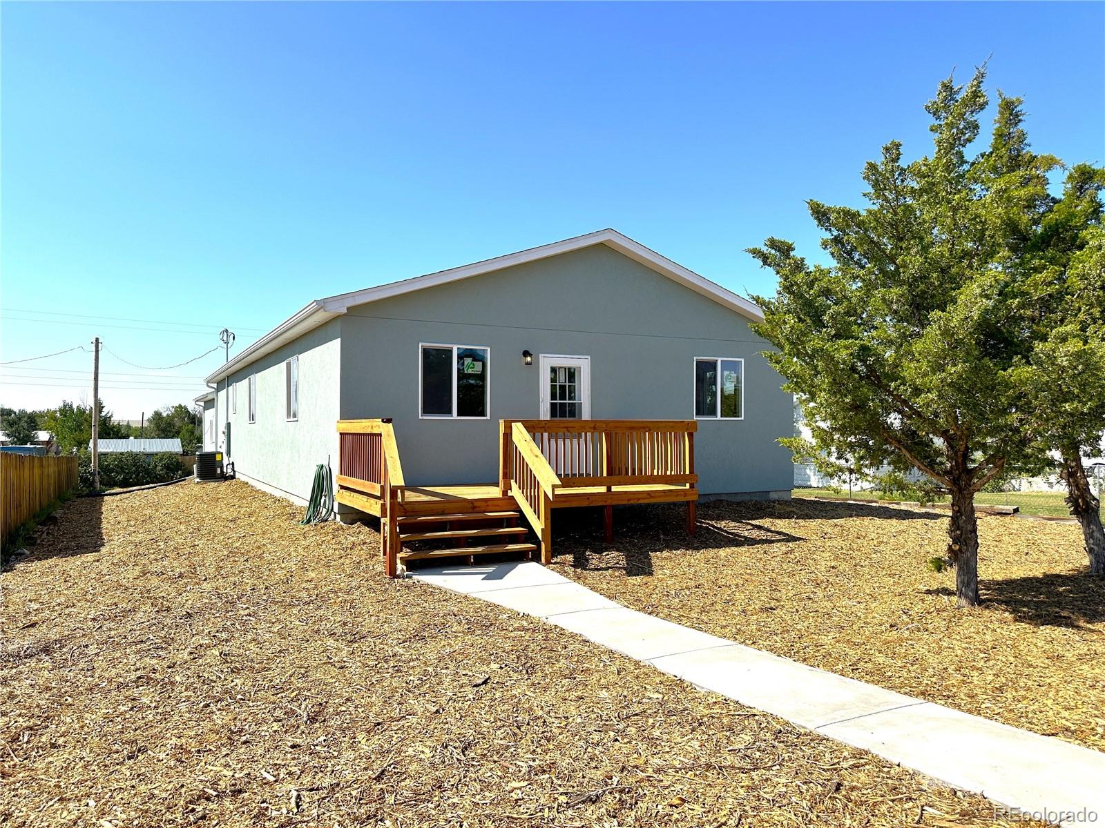 a view of a house with a patio