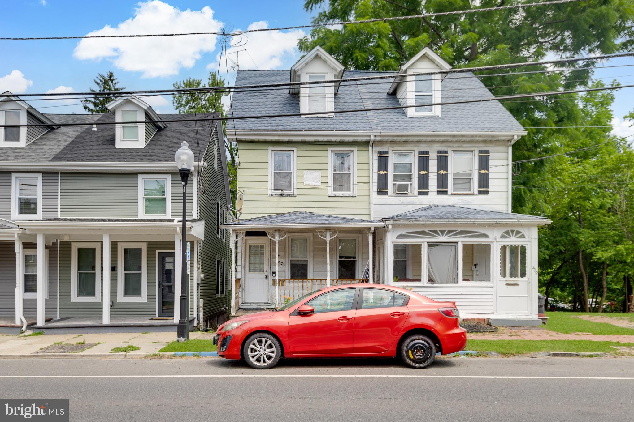 a car parked in front of a house