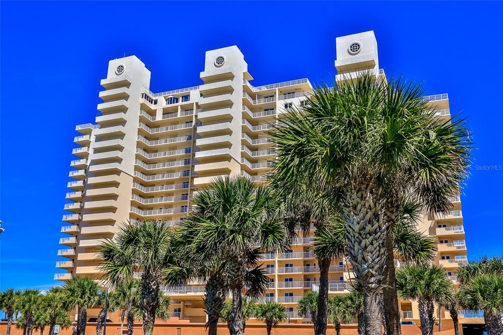 a view of a multi story residential apartment building