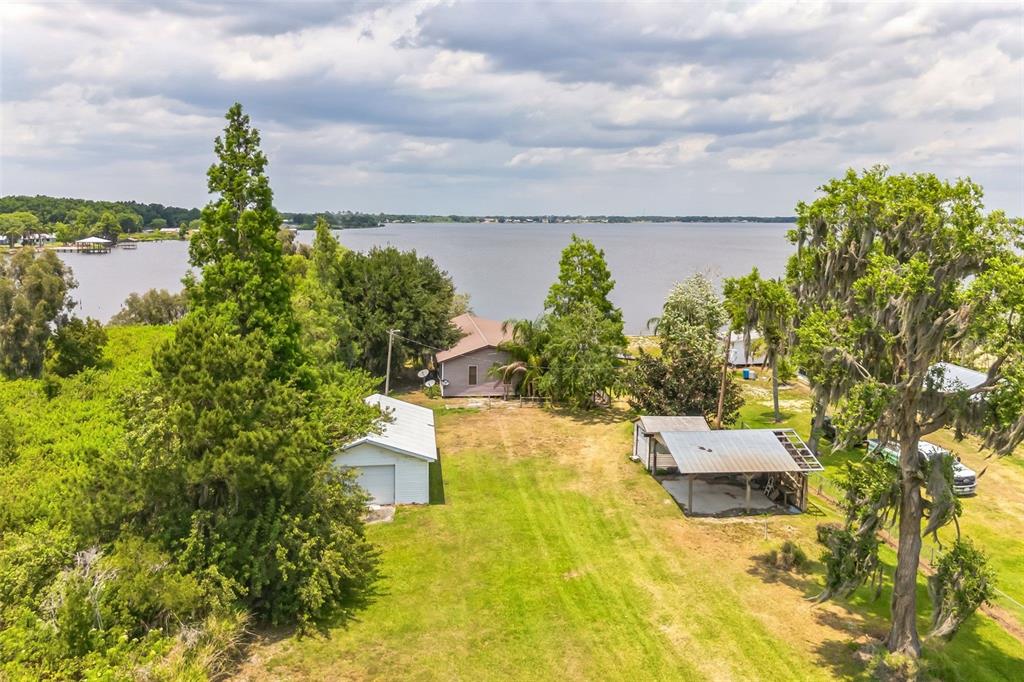 a view of a lake with a building in the background