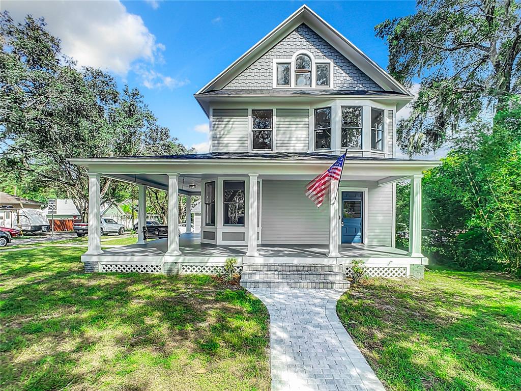 front view of a house with a yard