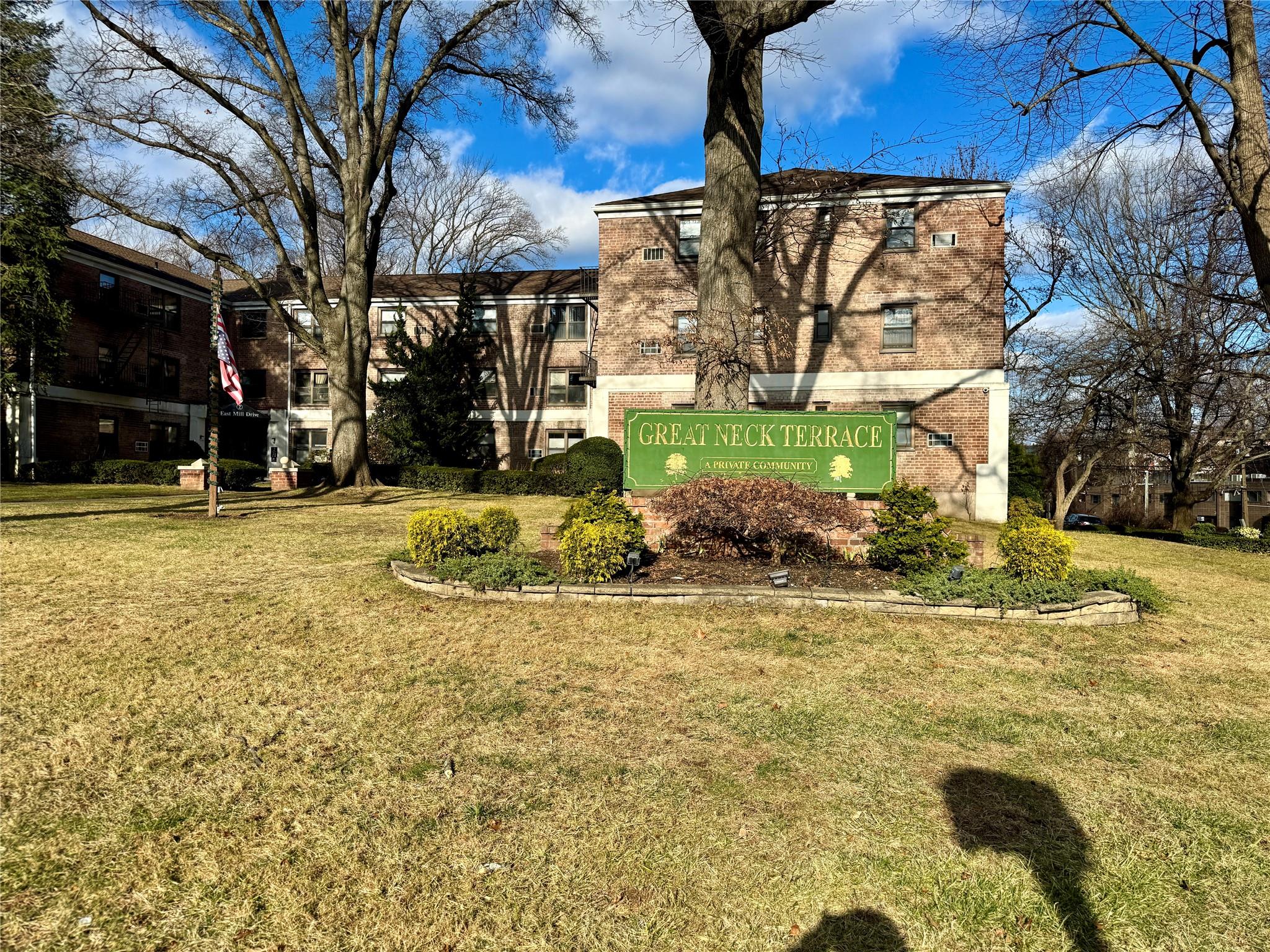 Community sign with a yard